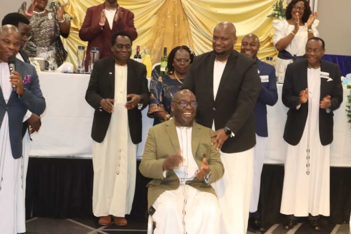 Chairman of Kabaka Foundation UK (seated) being introduced to guests at the event Chairman of Kabaka Foundation UK (seated) being introduced to guests at the event